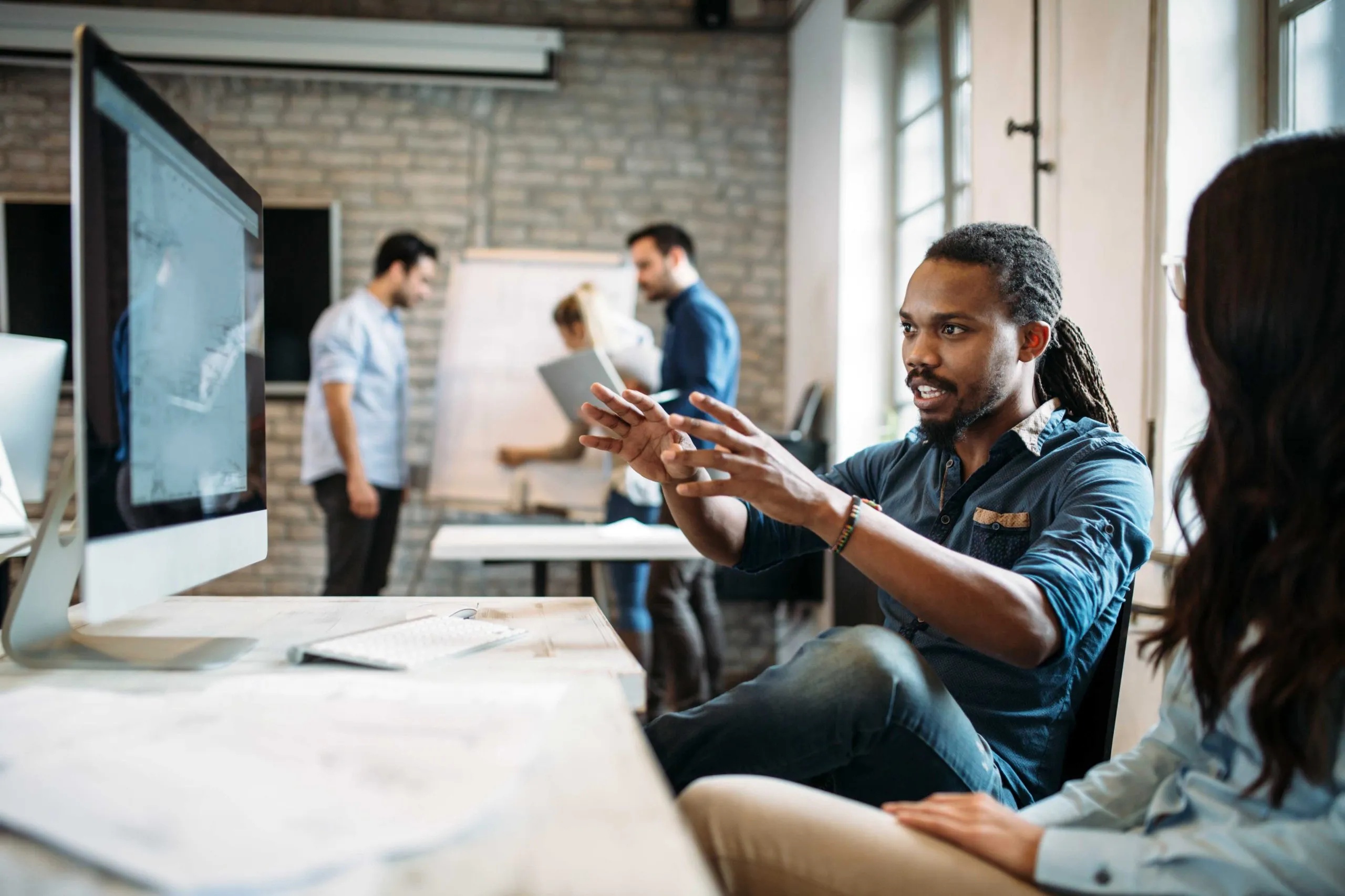 Project managers reviewing plans on a construction site