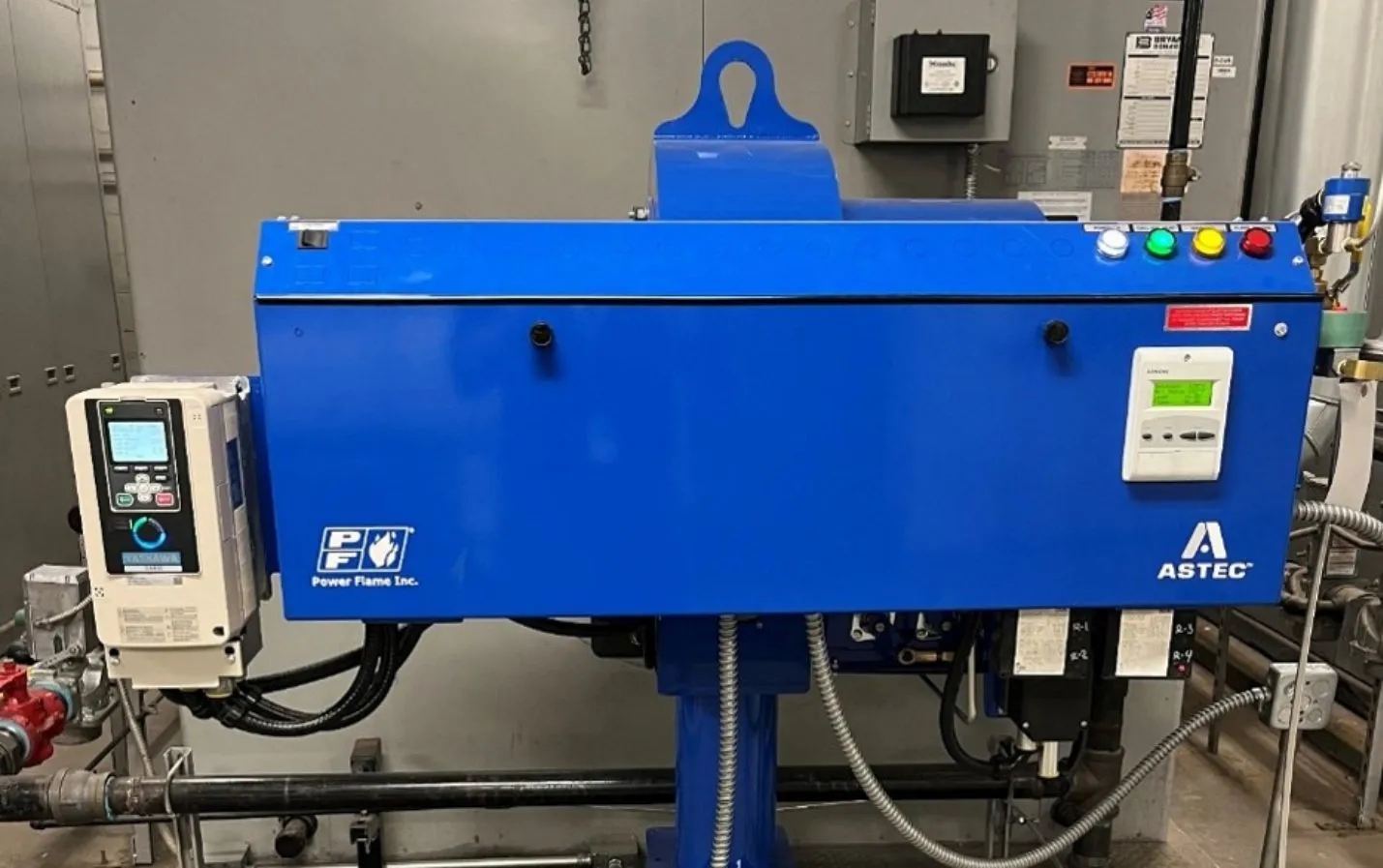 Replacement boiler burner assembly installed in a plant room